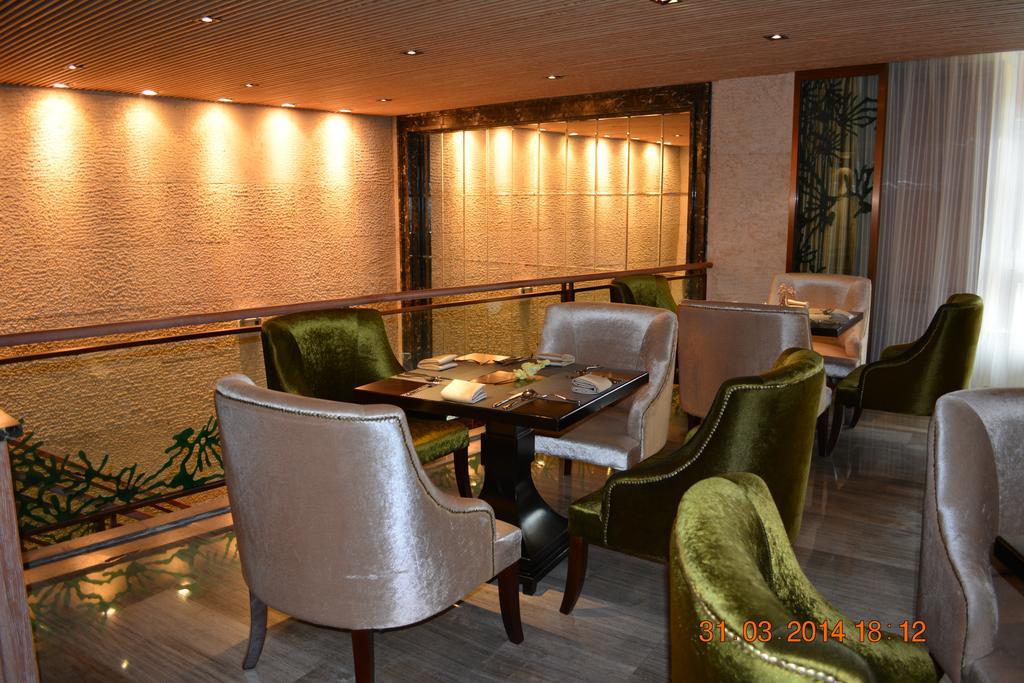 Mareka Haihe International Hotel Xichang Bagian luar foto